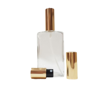 Frasco-vidrio-transparente-Broadway-50-ml-atomizador-y-capula-metalizado-oro-pulsador-negro-Fusté
