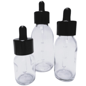Frasco-vidrio-aligerado-transparente-tapon-cuentagotas-urea-negro-tetina-negra-Fusté