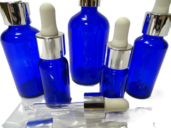 Frasco-vidrio-azul-cobalto-cuentagotas-urea-plata-tetina-blanca-Fusté