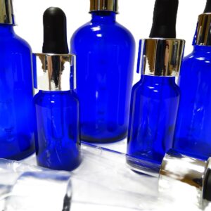 Frasco-vidrio-azul-cobalto-cuentagotas-urea-plata-tetina-negra-Fusté