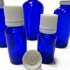Frasco-vidrio-azul-cobalto-precinto-blanco-Fusté