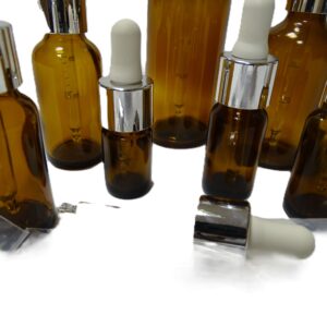 Frasco-vidrio-topacio-cuentagotas-urea-plata-tetina-blanca-Fusté