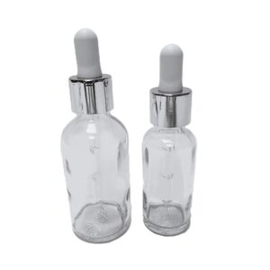 Frasco-vidrio-transparente-cuentagotas-urea-metalizada-plata-tetina-blanca-Fusté