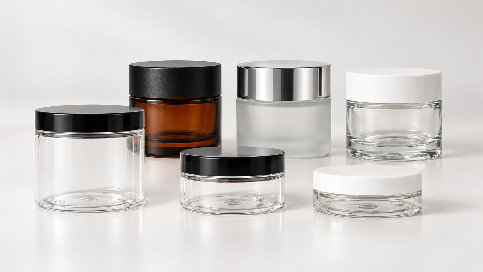Tarros para cosmética de vidrio y plástico PET con tapas negras, blancas y plateadas